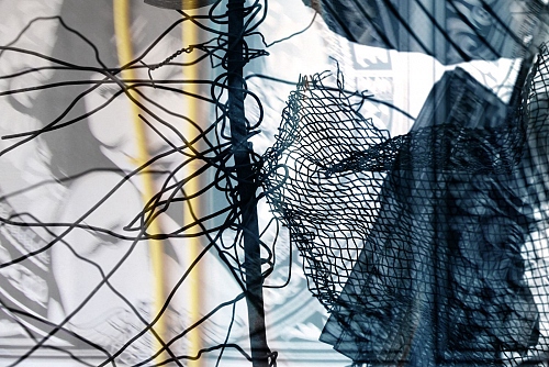 woman catched in a net  - © Doris Stricher